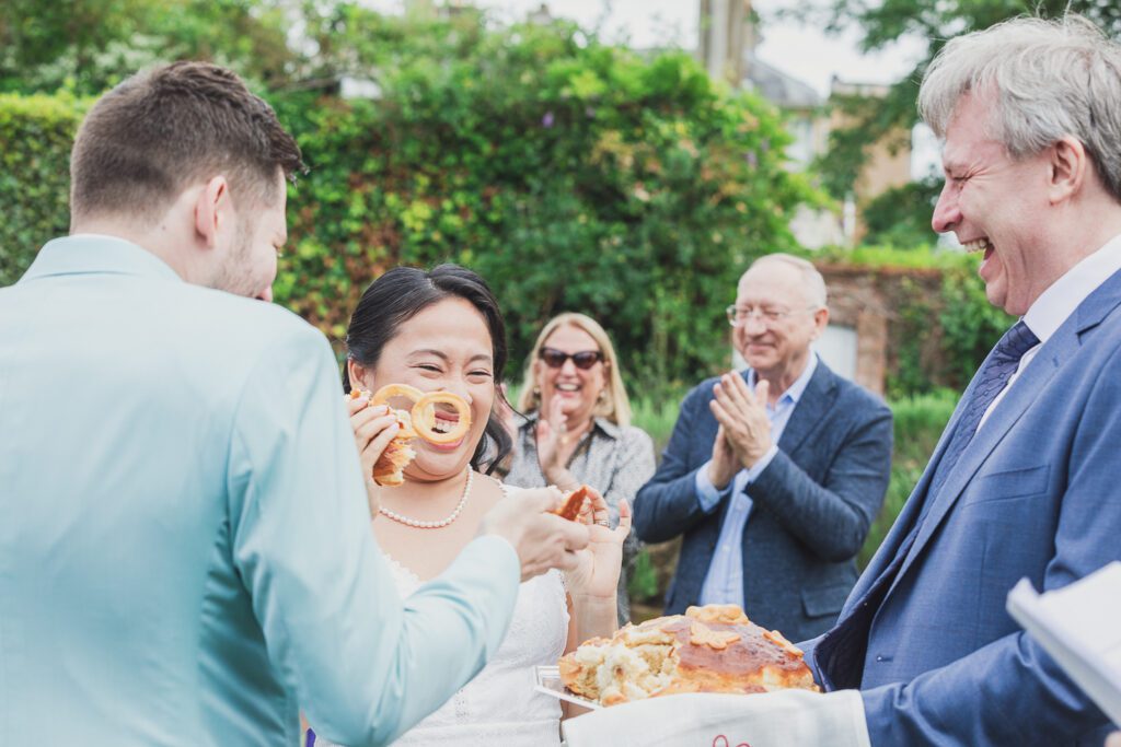 Bride and Groom taking part in a traditional Russian Bread and Salt Ceremony